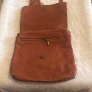 Leather crossbody with gun pocket